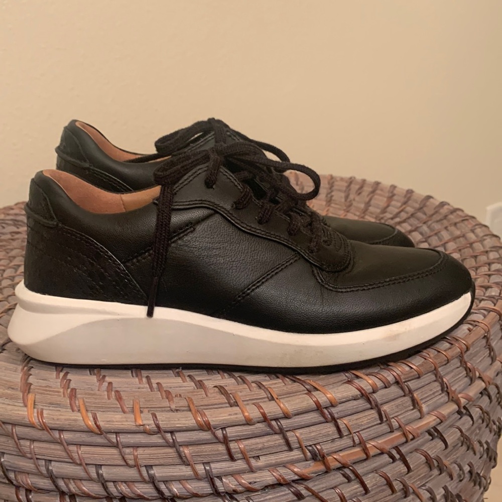 DONATED Clarks black leather sneaker, snake print heel detail. Excellent cond.